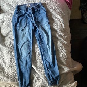 Slightly baggy blue jeans